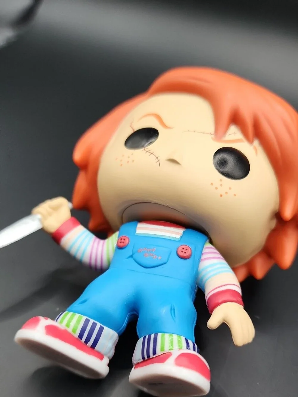 Funko Chucky Vinyl Figure with Orange Hair and Blue Overalls